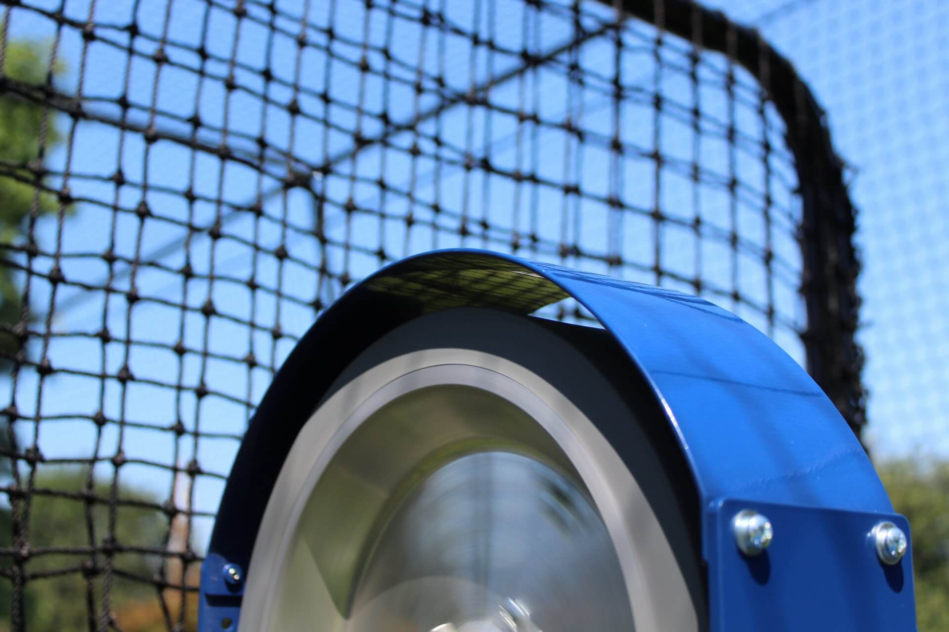 Fender on the top wheel of the bata 2 pitching machine