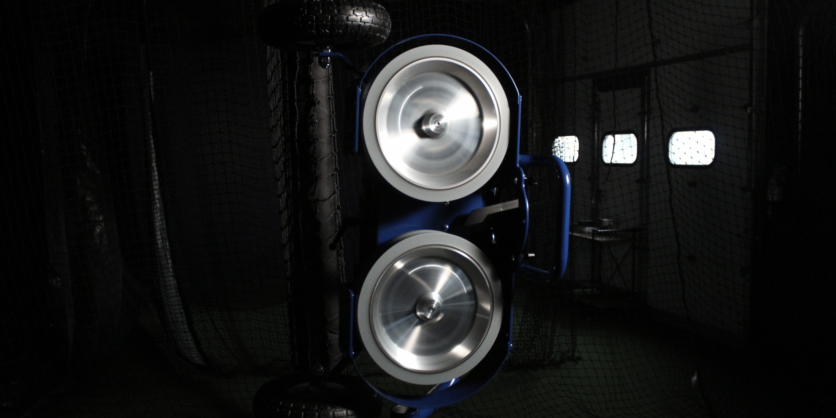 Bata 2 pitching machine in dark facility