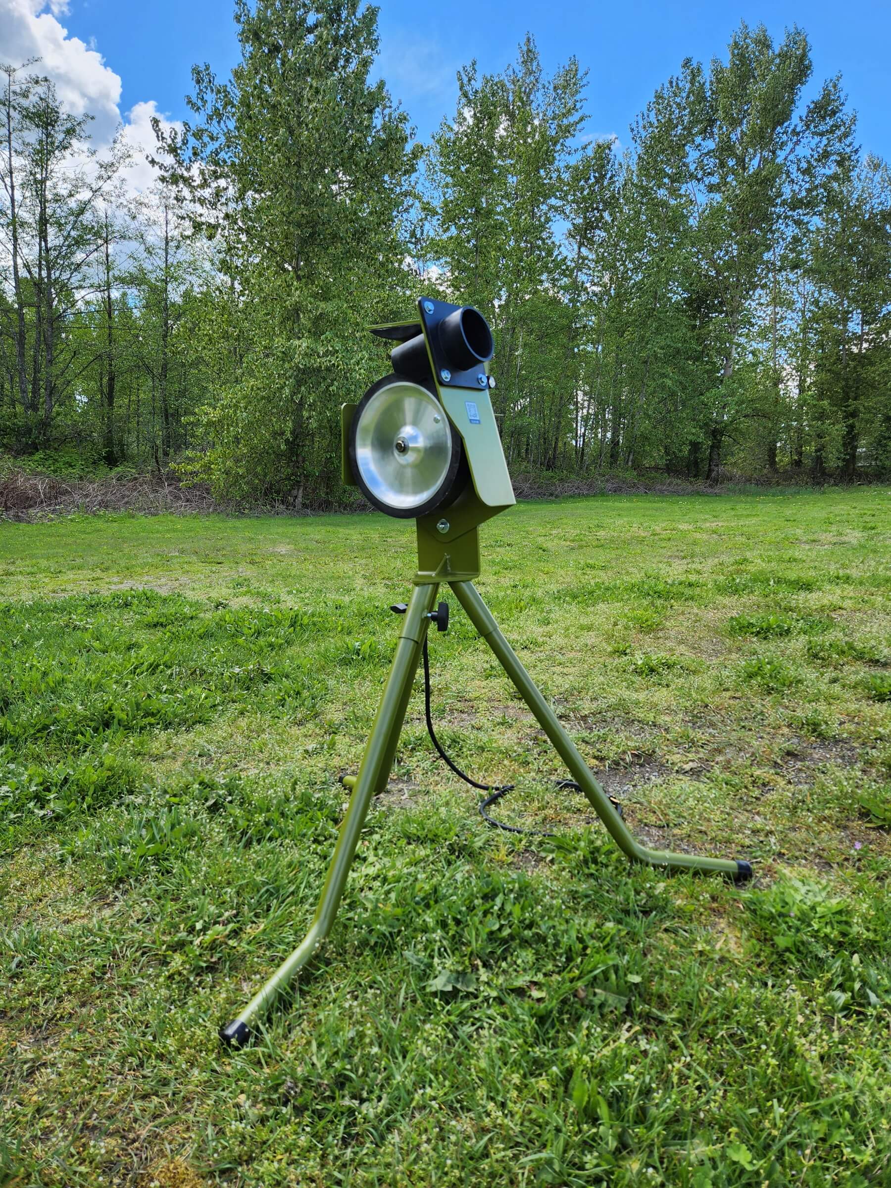 Mound Yeti 1 pitching machine in baseball position on grass