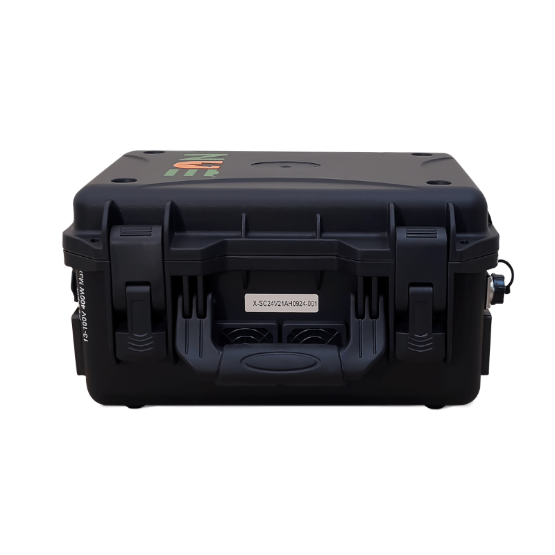 A black hard-shell case with latches, handle, and "Batting Cages Inc" logo in green and orange—ideal for carrying your NUE Suncase 605 Portable Battery or pitching machine securely.