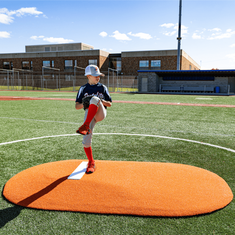 Boy pitching off of the Portolite 6in Full Length Game Mound