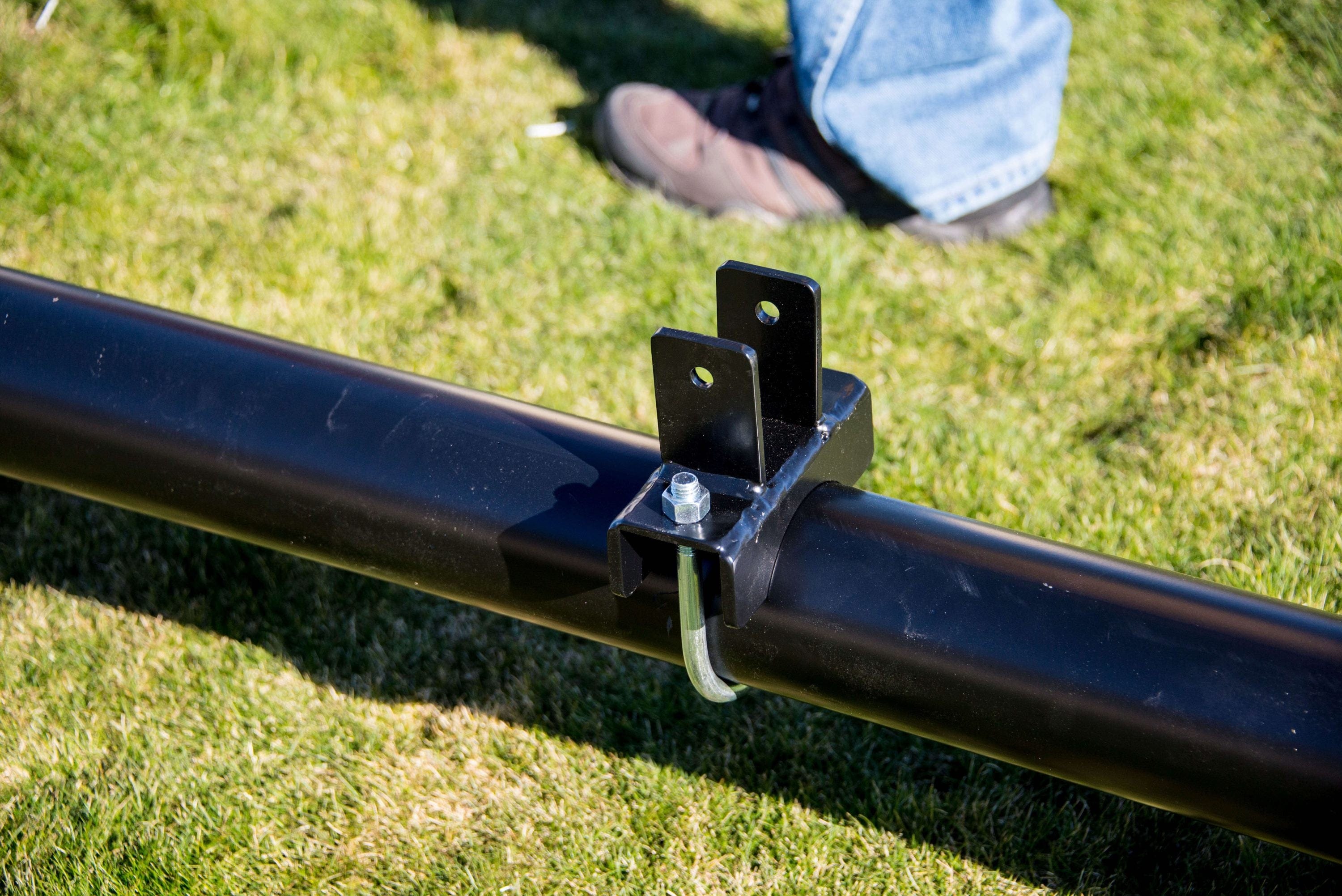 Close up of where the support pole attaches to the iron horse frame