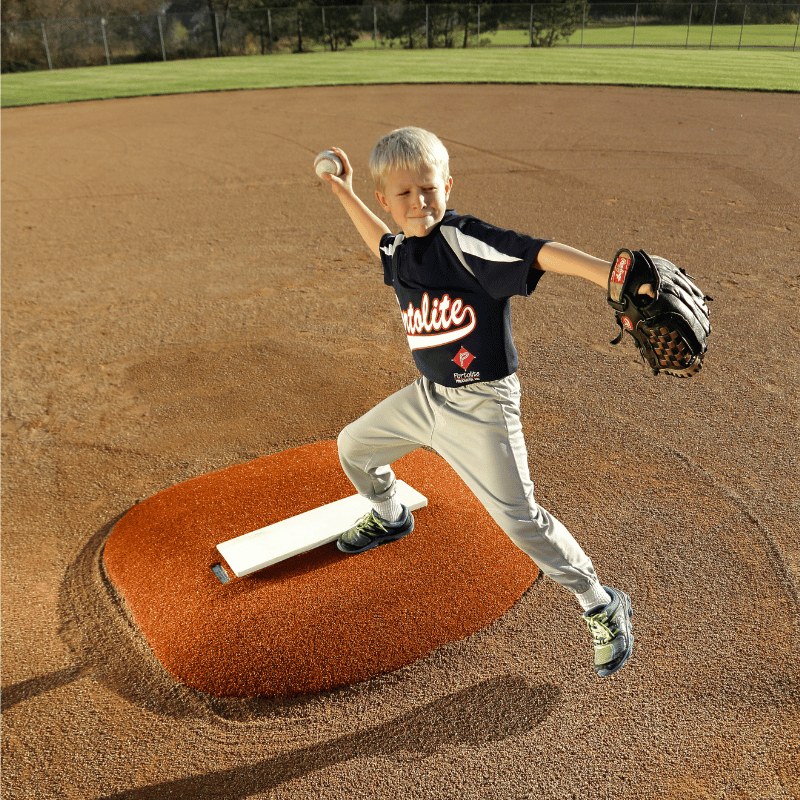 Boy pitching on Portolite 4in Stride Off Game Mound Clay