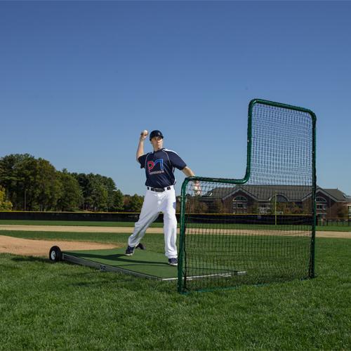 Man pitching ontop of the ProMound Pro Model Platform